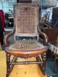 Antique kane back Child or baby rocking chair very cute seat has some damage see pics