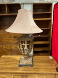 27 inch tall very decorative metal and wood table lamp with urn cage design