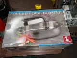 Covered oval oven roaster/by Roshco
