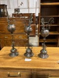 Set of three graduating antiqued Brushed copper look metal candleholders