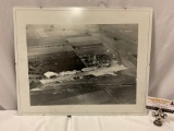 Vintage framed black-and-white photograph of an airport/airplane landing strip surrounded by fields,