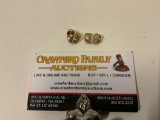 2 X 16k gold fillings. Approx 6.1grams as seen in pics . Sold as is.