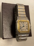 Stunning 1990s Santos de Cartier stainless steel /18K yellow gold wristwatch style no. 187901