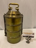 Antique brass tiffin 4 compartment meal carrier, approx 6 x 13 in.
