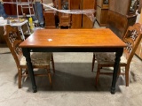 Smaller tiger oak country kitchen table with two vintage chairs