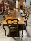 Vintage dining tiger oak table w/ 2 leaves, 6 upholstered chairs & protector pads