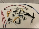 Lot of used sling shots, HOU SHIEUH crossbow pistol & target archery bow & arrow gear, sold as is.