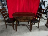 Solid wood mahogany finished Smaller kitchen table w/ 2 chairs & folding leaves