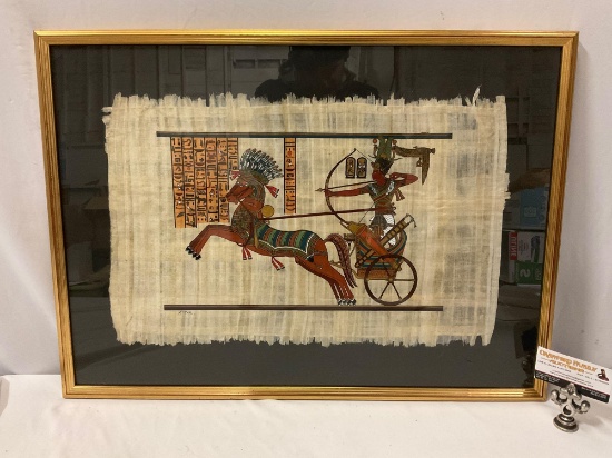 Nicely framed Egyptian parchment chariot artwork, approx 27 x 20 in.