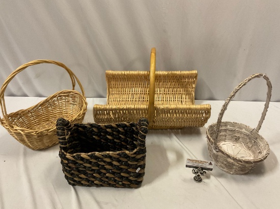 4 pc. lot of woven wicker baskets w/ handles, approx 18 x 13 x 15 in. largest.