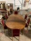 Antique 1830s Tiger Oak wood dinning table w/ 5 leaf and 6 chairs w/ red upholstery claw foot design