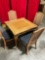 Nice wooden table by Davis with 4 cane back chairs