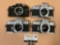 4 pc. lot of Minolta 35mm film cameras; SRT 100, SRT 101, SRT 102, X-700. sold as is.