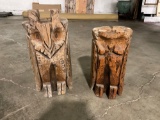 Pair of owl figures carved out of wood.
