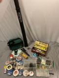 Large lot of fishing gear: PLANO canvas tackle bag, vintage metal kit filled w/ lures, hooks, line,