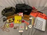 Lot of fishing gear: Cabelas bag, Field & Strem bag, vintage reel, fly hooks, line, weights, & more.