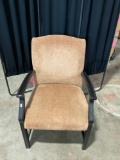 Nice beige and black cushioned arm chair
