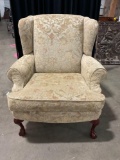 Upholstered wingback chair by Bancroft & Bliss