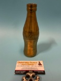 vintage brass Coca-Cola bottle shaped candle holder, made in India, approx 7 x 2 in.