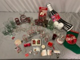 Nice lot of vintage Coca-Cola brand collectibles, glasses, polar bear anniversary clock & more.