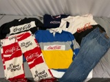 Lot of used vintage 1980s Coca-Cola brand clothing, denim jeans, bell bottoms, sweatshirts, shows
