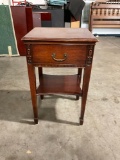Nice smaller wooden night stand with drawer.