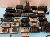 Huge 31 pc. lot of vintage film cameras; Vivitar, Olympus, Ricoh,, Minolta, Pentax, Canon, Nikon