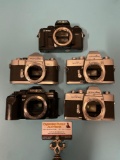 5 pc. lot of Minolta 35mm film cameras; SR1, SRT 201, SRT 101, X-700, Maxim 9000. sold as is.