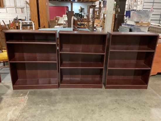 Set of 3 matching bookcases with adjustable/removable shelves.