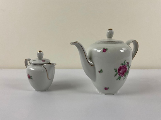 Bavarian tea pot and cream container, sold as is. see pics