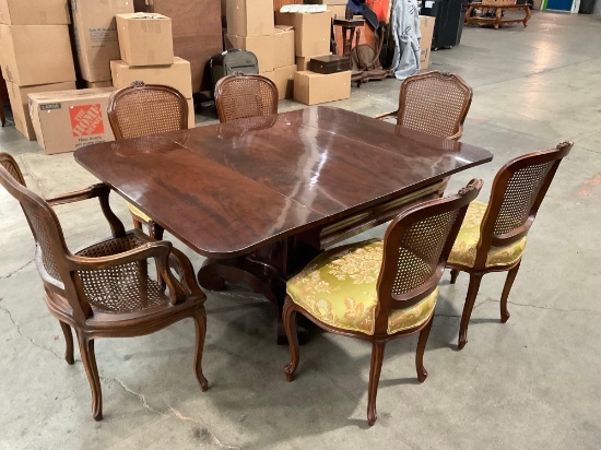 Solid Wood Dining Table and 6 chairs, plus extra matching upholstery.