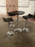 Circular Pub Table with 3 matching adjustable-height stools.