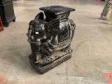 Ceramic elephant outdoor plant stand.