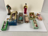 A lot of different vintage/collectible plastic dolls of various countries