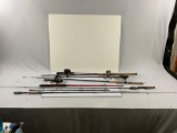 Assorted lot of fishing poles and reels