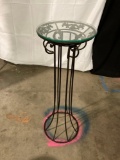 WROUGHT IRON PLANT STAND WITH GLASS TOP.