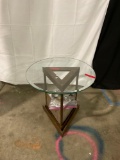 TRIANGLE FOUNTAIN TABLE WITH GLASS TOP AND ROCKS.