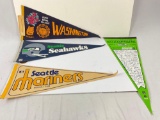 great collection of vintage Seattle sports pennants.
