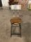 Single gray metal stool with beautiful wooden seat from WORLD MARKET.