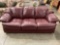 Burgundy Leather SEALY sofa by Klaussner Furniture. Matches lot # 277