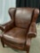 THOMASVILLE BROWN LEATHER ARMCHAIR WITH WINGBACK.