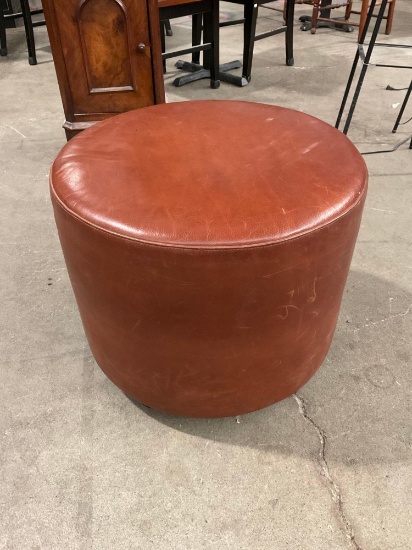 Custom Leather circular ottoman by KAAS TAILORED.