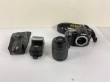 Nikon D80 DSLR camera and Minolta flash