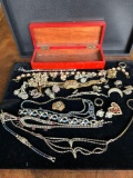 wooden jewelry box filled with vintage rhinestone jewelry , Napier, Monet etc..