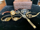 smaller wooden jewelry box with 7 vintage watches Timex, Bulova , and carriage