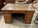Beautiful Antique Tiger Oak Desk with Dovetail drawers and glass top.