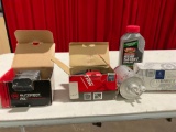 Assorted car parts and accessories.