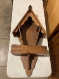 Vintage hand crafted birdhouse wall shelf.