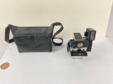 Vintage polaroid SX 70 land camera, with flash and soft case