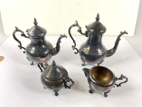 set of F.B Rogers Four dark blue footed Tea/Coffee pitchers with creamer& sugar containers.